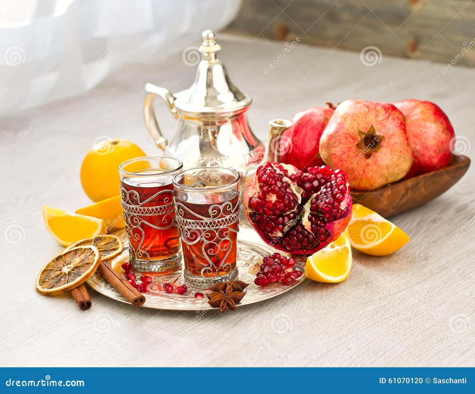 Traditional Arabic Tea with Metal Teapot and Fruits Stock Photo ...