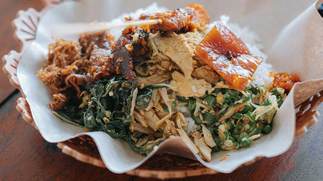 <strong>Babi guling: </strong>Bali's famed roasted suckling pig is made by rubbing the outside with turmeric and stuffing it with a spice paste. Then, it's roasted on a spit. It's mostly served with rice, spicy soup and a series of condiments.