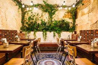 In a narrow little space all sizzling grills and flaming tandoor Soho restaurant Berenjak is inspired by the...